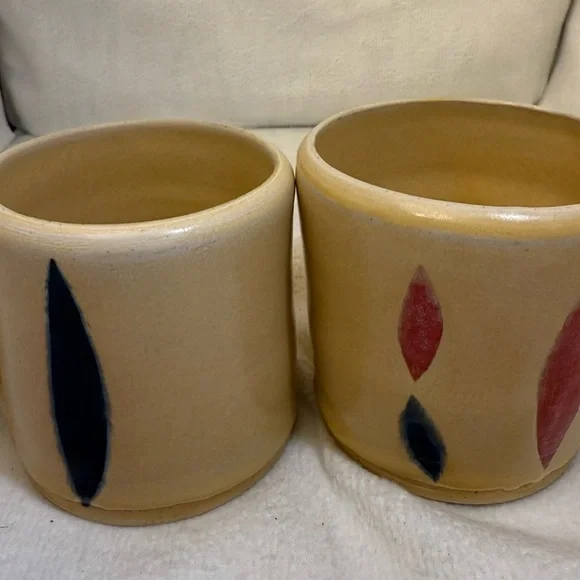 4/ studio art mugs. Tan with Black and Red Accents - Picture 3 of 5